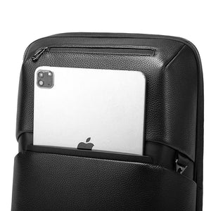 Black backpack open top compartment with elastic holder for laptop or tablet