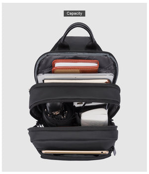 BANGE compact black waterproof crossbody bag front zip open, showing storage capacity
