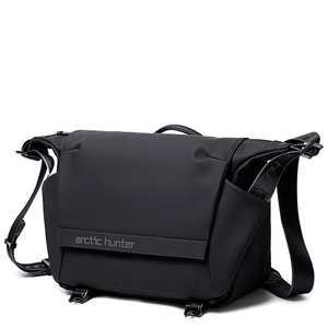 Black compact waterproof crossbody bag with front flap, logo panel, and adjustable strap