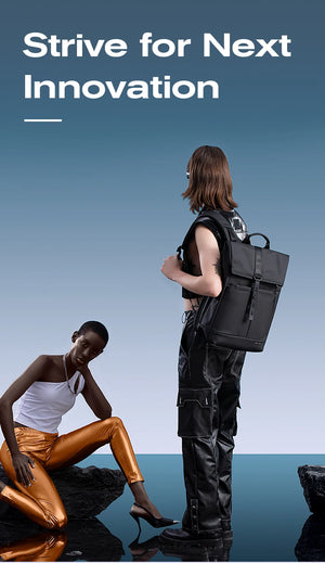 Black backpack carried by a person with adjustable shoulder straps and top flap.