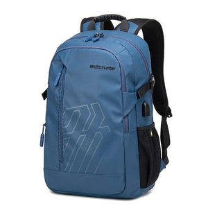 Blue waterproof travel backpack with front zip pocket and padded shoulder straps
