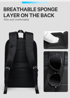 Black business backpack with breathable padded back panel and adjustable shoulder straps