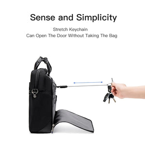 Black waterproof laptop bag with zip closure, front pocket, and open door flap