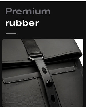 Black backpack front panel with rubberized latch and stitched details