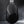 Black rhombus-style sling bag with smooth curved body and adjustable strap