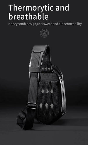 Black crossbody bag with breathable honeycomb-texture panel and adjustable strap