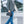 Black waterproof toiletry bag with top handle and zip closure, carried by a model.