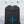 Black backpack back panel with thick padded sponge layer for comfort