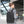 Expandable waterproof business backpack on person, black, front and side with shoulder straps
