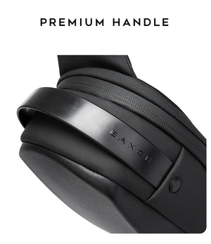 Premium handle area on a compact crossbody bag with textured material