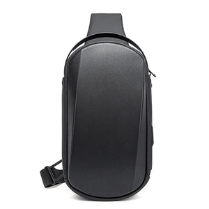 Black compact crossbody sling bag with curved front panel and side zippers