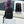 Black business backpack with front zip pocket and back straps for securing