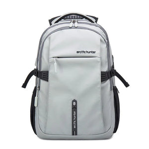 Ivory travel backpack with front zip pocket, padded straps, and side carry handles