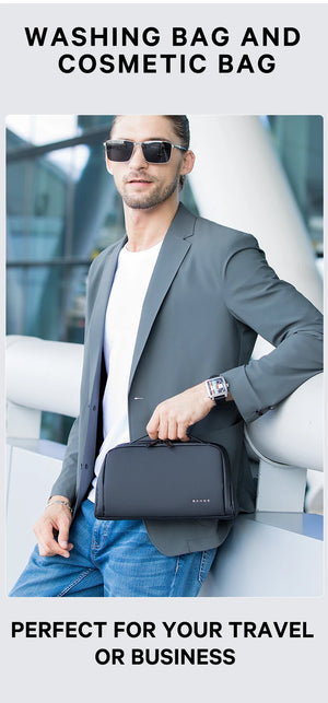 Black toiletry and cosmetic bag with handle and zip closure, worn crossbody on a model.