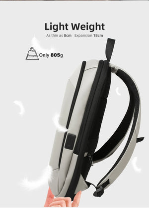Light gray travel backpack with adjustable padded shoulder straps, lightweight design