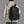 Person wearing a black backpack with 'arctic hunter' branding on a gray background