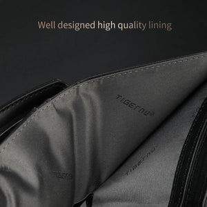Black Tigernu bi-fold wallet showing interior lining and embossed brand marks