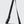 Black crossbody bag with adjustable webbing strap and front buckle strap details.