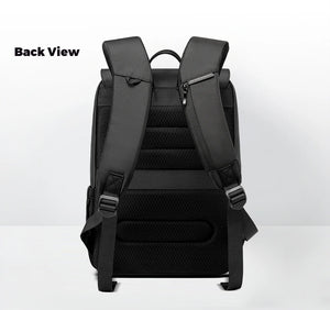 Black commuter backpack back view with padded shoulder straps and ventilation panel