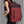 Red waterproof travel backpack with front zip pocket and adjustable shoulder straps
