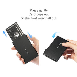 Black aluminum pop-up card holder showing card release and fold-out base