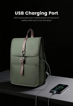 Green backpack with front flap and USB charging port cable connection