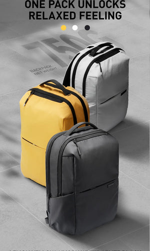 Two compact backpacks: lemon yellow and dark gray with shared black trim details