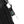 Black backpack side zipper with metal carabiner and compass keychain charm