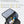 Black waterproof commuter backpack open front showing laptop and organizer compartments