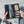 Black leather long wallet open with card slots and ID windows, phone sleeve