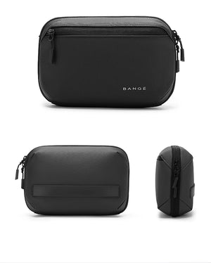 Black waterproof tech storage bag with zippered front, side view and carrying loop