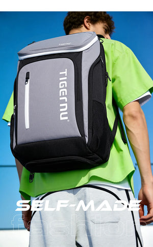 Light gray and black waterproof travel backpack with front zip and top handle
