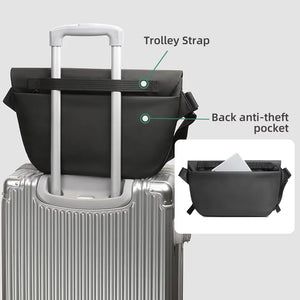 Black crossbody bag on luggage with trolley strap and back anti-theft pocket