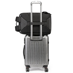 Black laptop backpack with luggage trolley sleeve and top handle; rear view