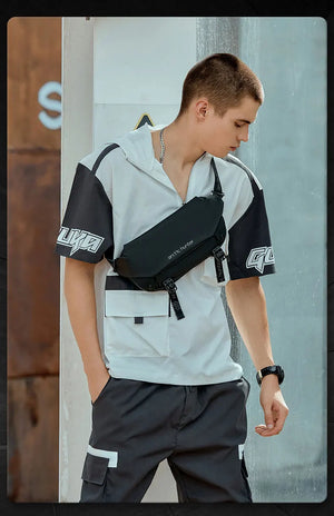 Black crossbody sling bag on person with adjustable strap and zip closure