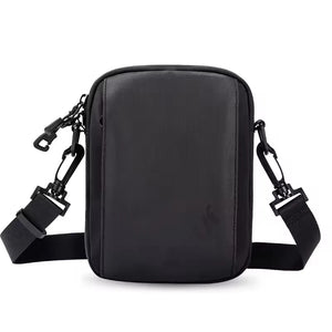 Black waterproof crossbody messenger bag with flap and adjustable shoulder strap