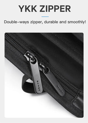 Double-ways zipper detail on black laptop backpack