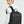 Man wearing a black travel backpack with front pocket and adjustable shoulder straps