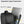 Black backpack with independent laptop compartment for 17.3-inch laptop and 12.9-inch iPad.
