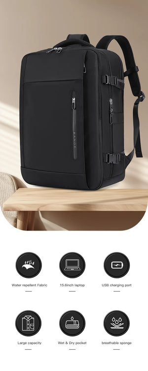 Black travel backpack on a table with USB charging port and multiple accessory icons