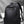 Black business commuter backpack with curved shoulder straps and front zip pocket
