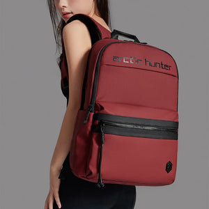 Red backpack with 'Arctic Hunter' branding on a gray background