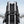 Black waterproof backpack with back luggage strap for securing to a suitcase handle