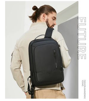 Black waterproof backpack worn on back with padded back panel and adjustable shoulder straps