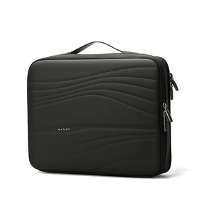 Black padded laptop sleeve with quilted wave pattern and top carry handle