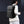 Black large travel backpack worn by a person, side view