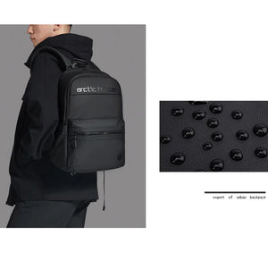 Person wearing a black backpack with 'arctic hunter' branding, close-up of backpack texture, and text 'expert of urban backpack'.