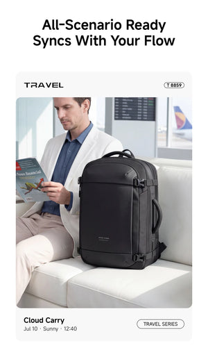 Black waterproof business backpack with top handle and shoulder straps, shown packed and ready to carry.