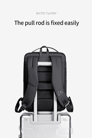 Black backpack with back luggage pass-through frame for rolling suitcase handle
