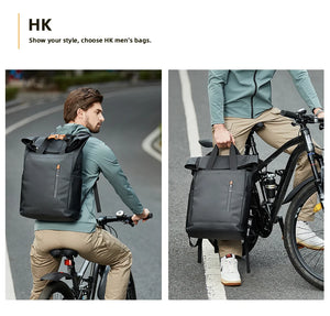 Black expandable roll-top backpack shown with bicycle use, front zip pocket, and carry handles.